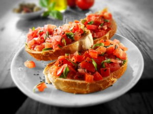 Fresh chopped beefsteak tomato bruschettas